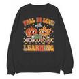 Retro Fall In Love With Learning Autumn Pumpkin Teachers Unisex Sweatshirt, trending gift Retro Fall In Love With Learning Autumn Pumpkin Teachers Unisex Sweatshirt, trending gift