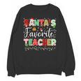 Santas Favorite Teacher Christmas Matching Xmas Men Women Unisex Sweatshirt, trending gift Santas Favorite Teacher Christmas Matching Xmas Men Women Unisex Sweatshirt, trending gift