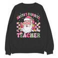 Santa's Favorite Teacher Groovy Christmas Teacher Boys Girls Unisex Sweatshirt, Groovy Teacher Gifts, trending gift Santa's Favorite Teacher Groovy Christmas Teacher Boys Girls Unisex Sweatshirt, Groovy Teacher Gifts, trending gift