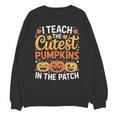 I Teach The Cutest Pumpkins Tshirt Halloween Teacher Unisex Sweatshirt, trending gift I Teach The Cutest Pumpkins Tshirt Halloween Teacher Unisex Sweatshirt, trending gift