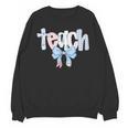 Teach Teacher Coquette Bow Pencil Back To School First Day Unisex Sweatshirt, trending gift Teach Teacher Coquette Bow Pencil Back To School First Day Unisex Sweatshirt, trending gift