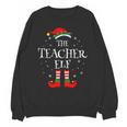 The Teacher Elf Christmas Family Matching Group Xmas Unisex Sweatshirt, trending gift The Teacher Elf Christmas Family Matching Group Xmas Unisex Sweatshirt, trending gift