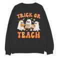 Teacher Halloween Trick Or Teach Retro Groovy Floral Ghost Unisex Sweatshirt, Groovy Teacher Gifts, trending gift