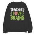 Teachers Love Brains Halloween Teacher Zombie Unisex Sweatshirt, trending gift Teachers Love Brains Halloween Teacher Zombie Unisex Sweatshirt, trending gift