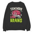 Teachers Love Brains Skeleton Halloween Teacher Funny Unisex Sweatshirt, trending gift Teachers Love Brains Skeleton Halloween Teacher Funny Unisex Sweatshirt, trending gift