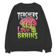 Teachers Love Brains Zombie Teacher Halloween Zombies Unisex Sweatshirt, trending gift