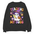 Teaching My Boos Teacher Ghost Teach Halloween Teacher Unisex Sweatshirt, trending gift