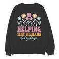 Tiny People Help Do Big Things Nursery Teacher Unisex Sweatshirt, trending gift