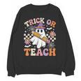 Trick Or Teach Groovy Teacher Halloween Retro Ghost Unisex Sweatshirt, Groovy Teacher Gifts, trending gift Trick Or Teach Groovy Teacher Halloween Retro Ghost Unisex Sweatshirt, Groovy Teacher Gifts, trending gift