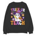 Trick Or Teach Teacher Ghost Teaching Fun Halloween Teacher Unisex Sweatshirt, trending gift Trick Or Teach Teacher Ghost Teaching Fun Halloween Teacher Unisex Sweatshirt, trending gift