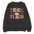 Trick Or Teach Teacher Halloween Costume Men Women Unisex Sweatshirt, trending gift Trick Or Teach Teacher Halloween Costume Men Women Unisex Sweatshirt, trending gift