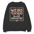 Weird Teachers Build Character Leopard Retro Teacher Unisex Sweatshirt, trending gift Weird Teachers Build Character Leopard Retro Teacher Unisex Sweatshirt, trending gift