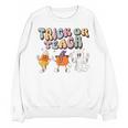 Trick Or Teach Candy Corn Pumpkin Ghost Teacher Unisex Sweatshirt, trending gift Trick Or Teach Candy Corn Pumpkin Ghost Teacher Unisex Sweatshirt, trending gift