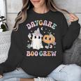 Daycare Boo Crew Groovy Halloween Floral Ghost Kid Teacher Unisex Sweatshirt, Groovy Teacher Gifts, funny design