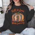 Fall In Love With Learning Book Lover Autumn Pumpkin Teacher Unisex Sweatshirt, funny design