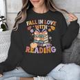 Fall In Love With Reading Halloween Stack Of Book Teacher Unisex Sweatshirt, funny design Fall In Love With Reading Halloween Stack Of Book Teacher Unisex Sweatshirt, funny design