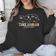 Groovy Tiny Human Tamer Floral Kindergarten Teacher Unisex Sweatshirt, Groovy Teacher Gifts, funny design