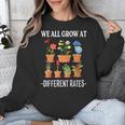 We All Grow At Different Rates Back To School Teacher Unisex Sweatshirt, funny design We All Grow At Different Rates Back To School Teacher Unisex Sweatshirt, funny design