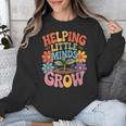 Helping Little Minds Grow Teacher First Day Back To School Unisex Sweatshirt, funny design Helping Little Minds Grow Teacher First Day Back To School Unisex Sweatshirt, funny design