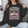 In October 2nd Grade Teachers Wear Pink Ribbon Breast Cancer Unisex Sweatshirt, funny design