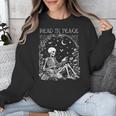 Read In Peace Skeleton Reading Teacher Spooky Halloween Unisex Sweatshirt, funny design Read In Peace Skeleton Reading Teacher Spooky Halloween Unisex Sweatshirt, funny design