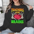 Teacher Teachers Love Brains Skeleton Hand Heart Halloween Unisex Sweatshirt, funny design Teacher Teachers Love Brains Skeleton Hand Heart Halloween Unisex Sweatshirt, funny design