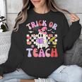 Trick Or Teach Halloween Teacher Floral Ghost Groovy Unisex Sweatshirt, Groovy Teacher Gifts, funny design Trick Or Teach Halloween Teacher Floral Ghost Groovy Unisex Sweatshirt, Groovy Teacher Gifts, funny design