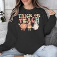 Trick Or Teach Pumpkin Candy Corn Ghost Halloween Teacher Unisex Sweatshirt, funny design
