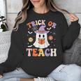 Trick Or Teach Teacher Groovy Ghost Halloween Teacher Unisex Sweatshirt, Groovy Teacher Gifts, funny design Trick Or Teach Teacher Groovy Ghost Halloween Teacher Unisex Sweatshirt, Groovy Teacher Gifts, funny design
