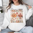 One Thankful Teacher Thanksgiving Groovy Fall Autumn Teacher Unisex Sweatshirt, Groovy Teacher Gifts, funny design One Thankful Teacher Thanksgiving Groovy Fall Autumn Teacher Unisex Sweatshirt, Groovy Teacher Gifts, funny design