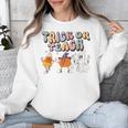 Trick Or Teach Candy Corn Pumpkin Ghost Teacher Unisex Sweatshirt, funny design Trick Or Teach Candy Corn Pumpkin Ghost Teacher Unisex Sweatshirt, funny design