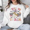 Trick Or Teach Groovy Teacher Halloween Retro Floral Ghost Unisex Sweatshirt, Groovy Teacher Gifts, funny design Trick Or Teach Groovy Teacher Halloween Retro Floral Ghost Unisex Sweatshirt, Groovy Teacher Gifts, funny design