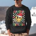Santas Favorite Teacher Retro Groovy Smile Face Christmas Unisex Sweatshirt, Groovy Teacher Sweatshirts, funny gift Santas Favorite Teacher Retro Groovy Smile Face Christmas Unisex Sweatshirt, Groovy Teacher Sweatshirts, funny gift