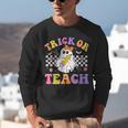 Trick Or Teach Groovy Halloween Teachers Unisex Sweatshirt, funny gift Trick Or Teach Groovy Halloween Teachers Unisex Sweatshirt, funny gift