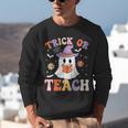 Trick Or Teach Teacher Groovy Ghost Halloween Teacher Unisex Sweatshirt, Groovy Teacher Sweatshirts, funny gift Trick Or Teach Teacher Groovy Ghost Halloween Teacher Unisex Sweatshirt, Groovy Teacher Sweatshirts, funny gift