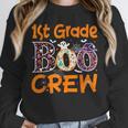 1st Grade Boo Crew First Grade Halloween Teacher Unisex Sweatshirt, novelty gifts, funny gifts 1st Grade Boo Crew First Grade Halloween Teacher Unisex Sweatshirt, novelty gifts, funny gifts