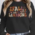 Fall In Love With Learning Autum Thanksgiving Teacher Kids Unisex Sweatshirt, novelty gifts, funny gifts Fall In Love With Learning Autum Thanksgiving Teacher Kids Unisex Sweatshirt, novelty gifts, funny gifts
