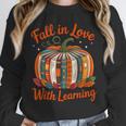 Fall In Love With Learning Book Lover Autumn Pumpkin Teacher Unisex Sweatshirt, novelty gifts, funny gifts
