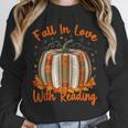 Fall In Love With Reading Pumpkin Autumn Librarians Teacher Unisex Sweatshirt, novelty gifts, funny gifts Fall In Love With Reading Pumpkin Autumn Librarians Teacher Unisex Sweatshirt, novelty gifts, funny gifts