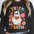 Groovy Halloween Trick Or Teach Retro Floral Ghost Teacher For Men Women Kids Unisex Sweatshirt, novelty gifts, funny gifts Groovy Halloween Trick Or Teach Retro Floral Ghost Teacher For Men Women Kids Unisex Sweatshirt, novelty gifts, funny gifts