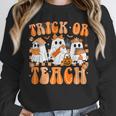 Groovy Teacher Halloween Trick Or Teach Ghost Men Women Kids Unisex Sweatshirt, novelty gifts, funny gifts Groovy Teacher Halloween Trick Or Teach Ghost Men Women Kids Unisex Sweatshirt, novelty gifts, funny gifts