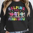 Helping Little Minds Grow Teacher Life Back To School Unisex Sweatshirt, novelty gifts, funny gifts