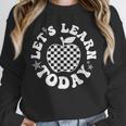 Let's Learn Today Checkered Apple Back To School Teacher Unisex Sweatshirt, novelty gifts, funny gifts