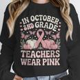 In October 2nd Grade Teachers Wear Pink Ribbon Breast Cancer Unisex Sweatshirt, novelty gifts, funny gifts