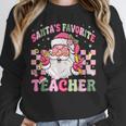 Santa's Favorite Teacher Groovy Christmas Teacher Boys Girls Unisex Sweatshirt, novelty gifts, funny gifts Santa's Favorite Teacher Groovy Christmas Teacher Boys Girls Unisex Sweatshirt, novelty gifts, funny gifts