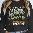 Social Studies Teacher Teach Scariest Zombies On Graveyard For Men Women Unisex Sweatshirt, novelty gifts, funny gifts