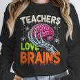 Teachers Love Brains Halloween 2025 Skeleton Costume Unisex Sweatshirt, novelty gifts, funny gifts