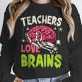 Teachers Love Brains Skeleton Halloween Teacher Funny Unisex Sweatshirt, novelty gifts, funny gifts Teachers Love Brains Skeleton Halloween Teacher Funny Unisex Sweatshirt, novelty gifts, funny gifts
