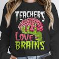 Teachers Love Brains Zombie Teacher Halloween Zombies Unisex Sweatshirt, novelty gifts, funny gifts
