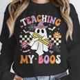 Teaching My Boos Ghost Teacher Cute Groovy Halloween Teacher Unisex Sweatshirt, novelty gifts, funny gifts
